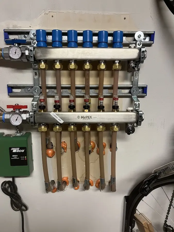 Plumber performing Gas Line Installation at a residential property in Franconia